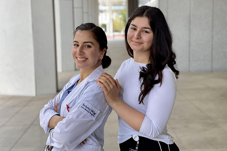 Nilufar and sister standing