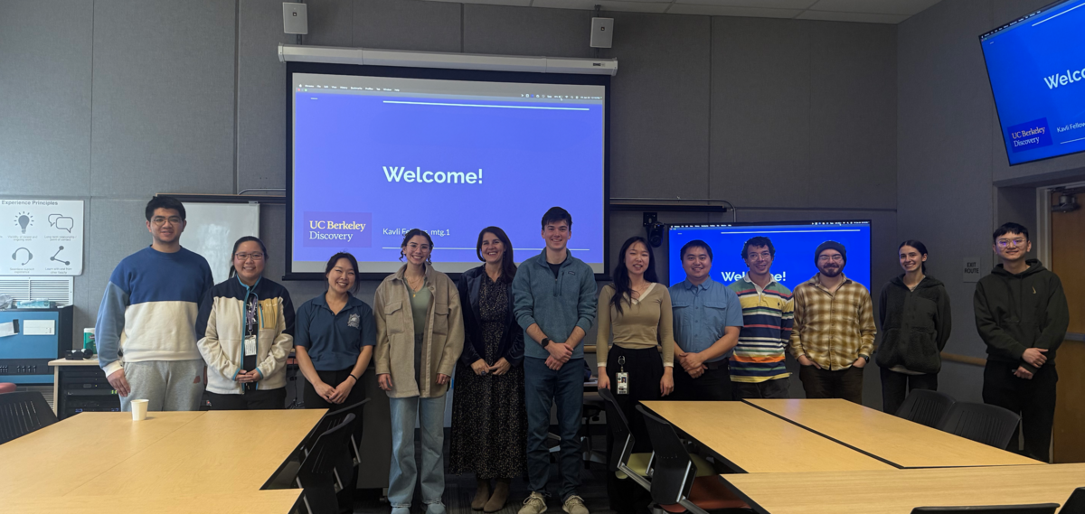 A group of students standing in a classroom at a Berkeley Discovery event